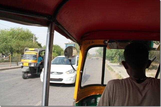 Our tuk-tuk driver saving time – you have no idea how we felt.